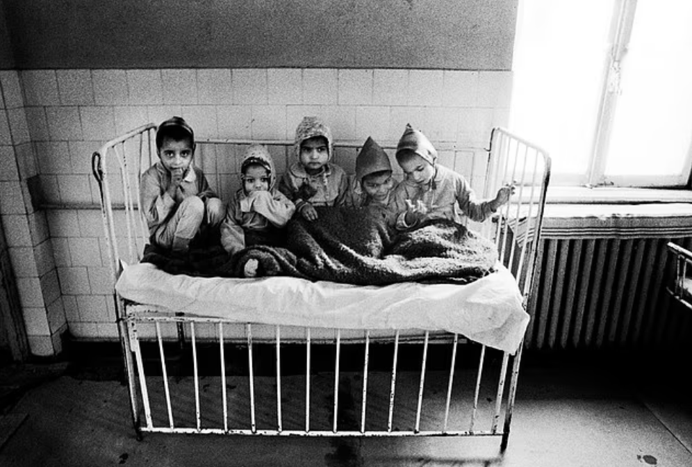 An orphanage in Bucharest, 1991: charity workers found starving children crammed into cots