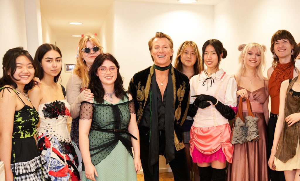 Students from LCF wearing fashion designs with Scott Wimsett 